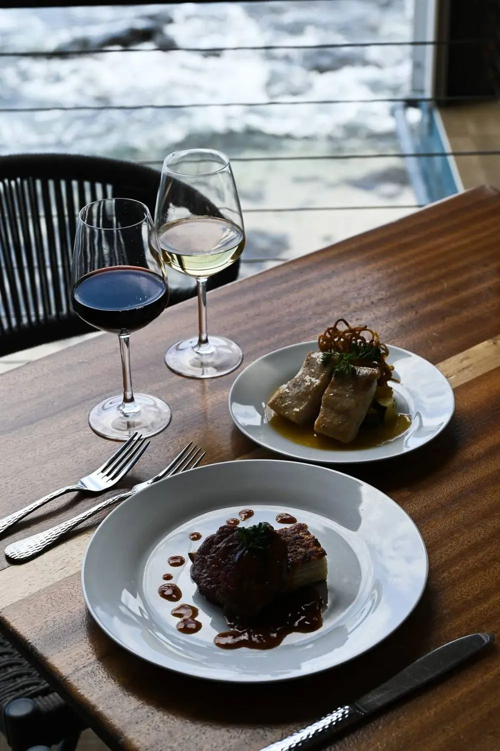 A plated dessert course with wine