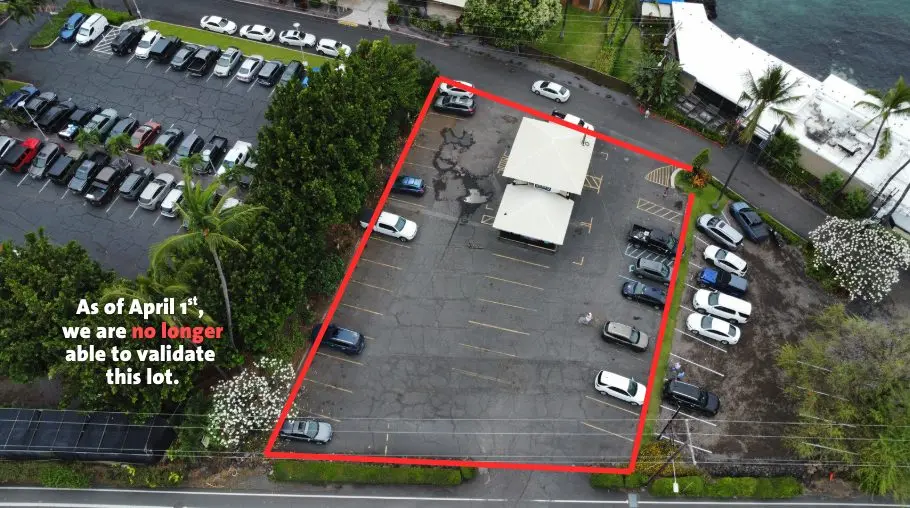 Aerial view of the paved lot, which is no longer validated