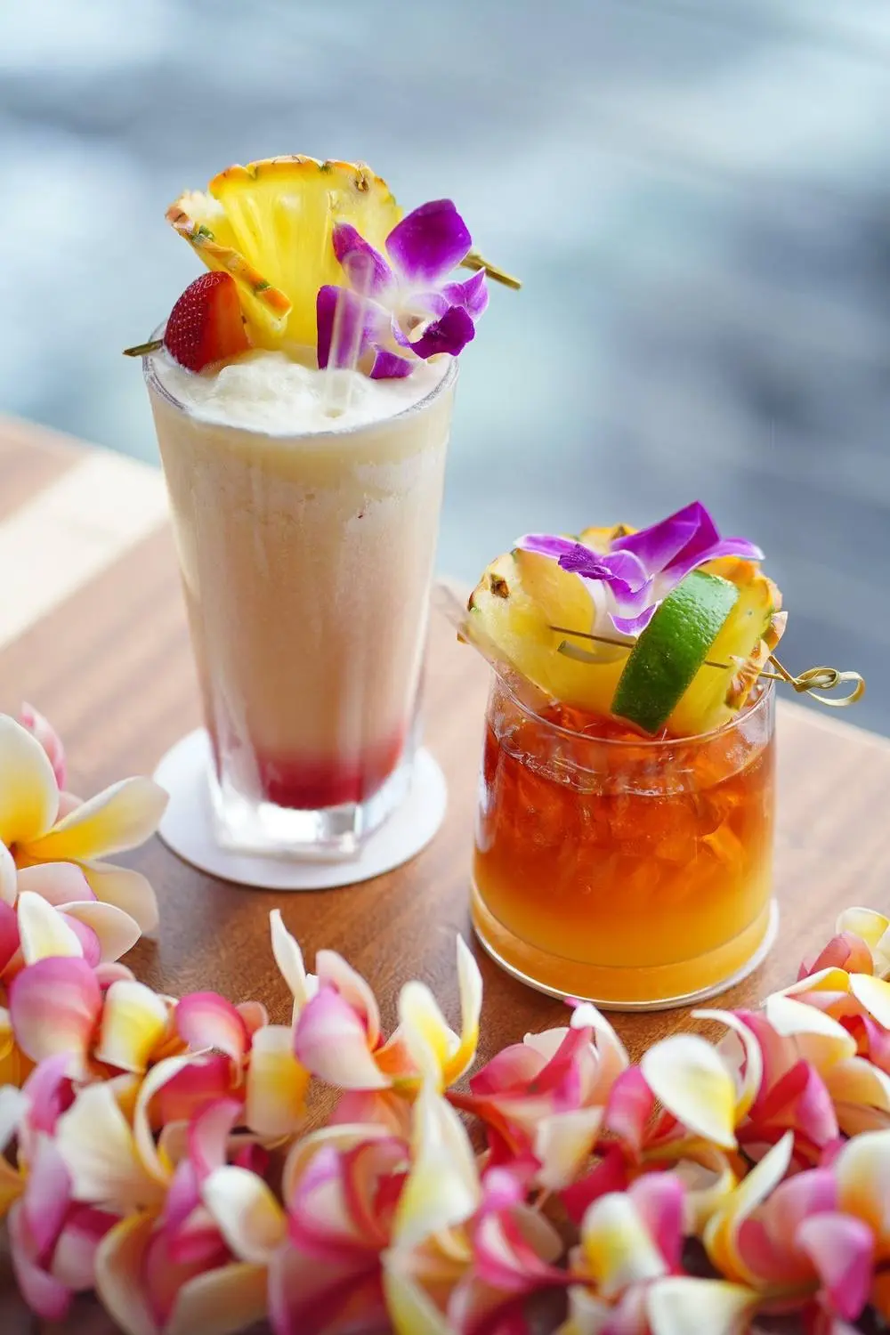 A Lava Flow and a Mai Tai on the rail above the water