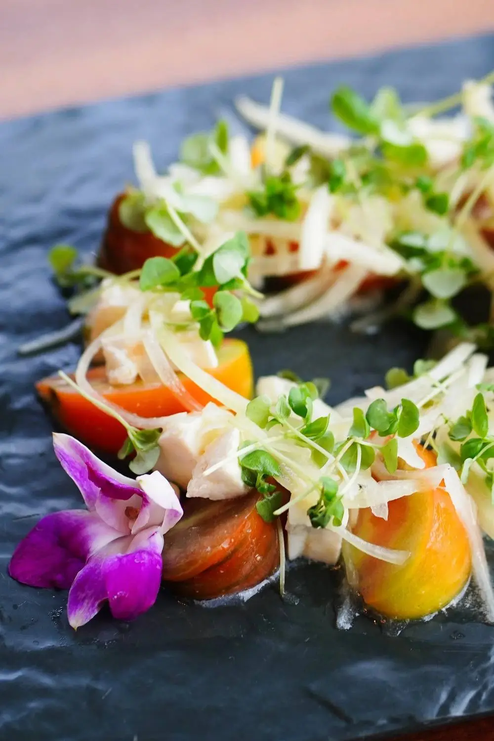 Heirloom tomato salad on slate